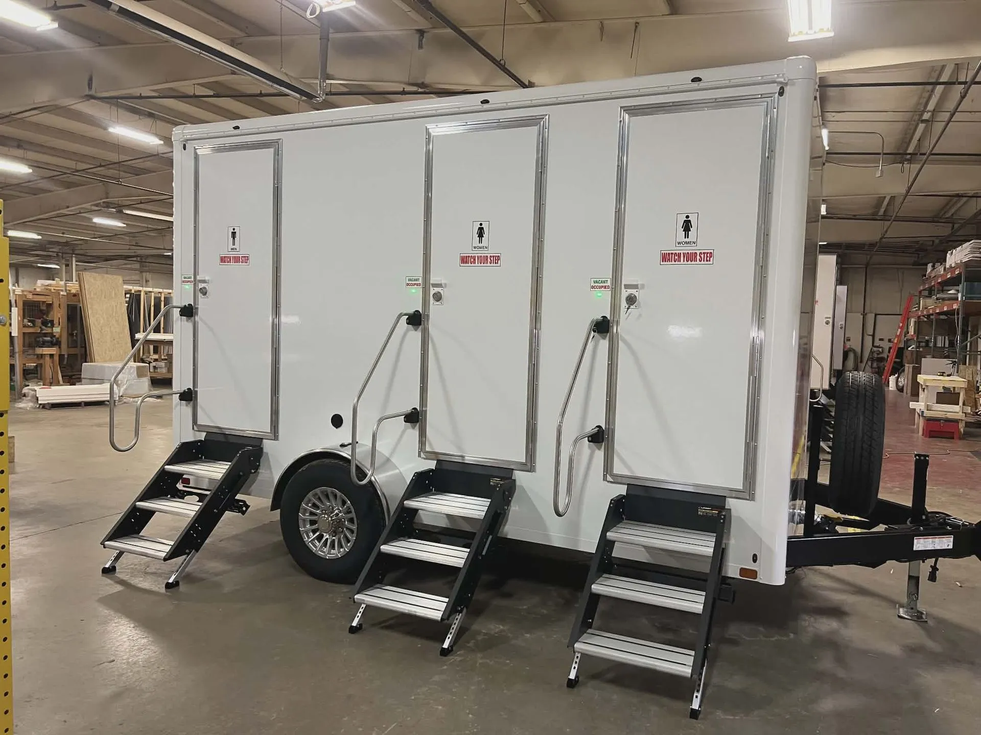 Three-stall luxury restroom trailer with private men's and women's entrances